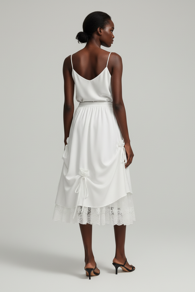 Jupe Dentelle Blanche À Nœuds Élégante